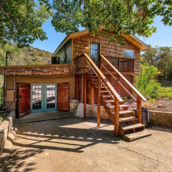 Riverfront Group Retreat | Hot Tub + Billiards | Sleeps 14 | Guadalupe River - Image 1